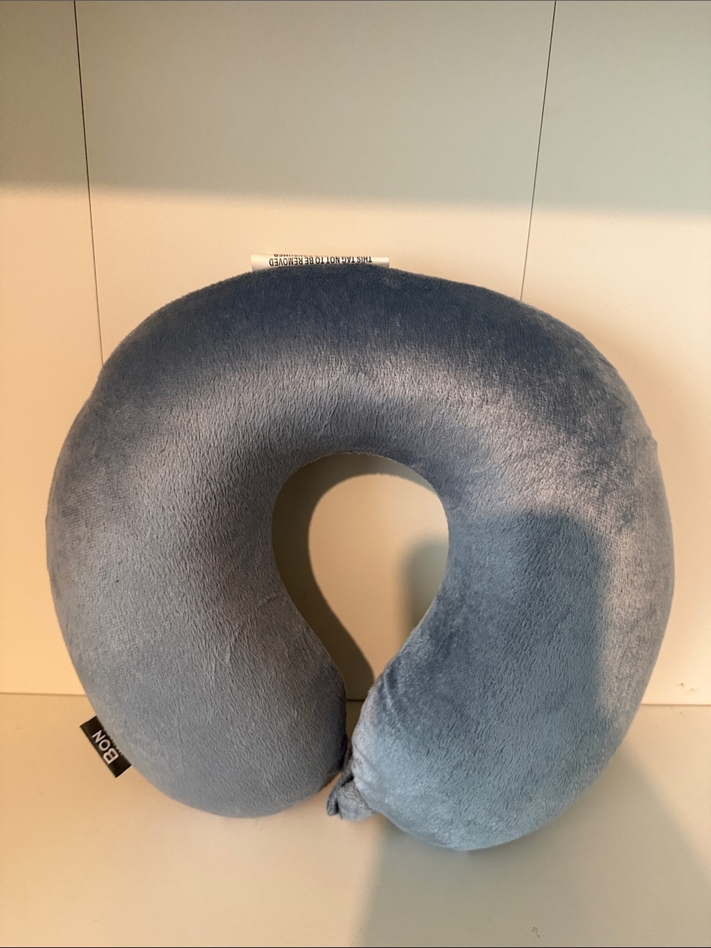 Bon Voyage Travel Plush Neck Pillow in Soft Blue.